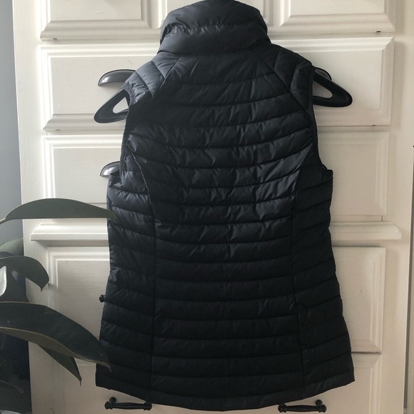 Black puffer vest. - Picture 2 of 5